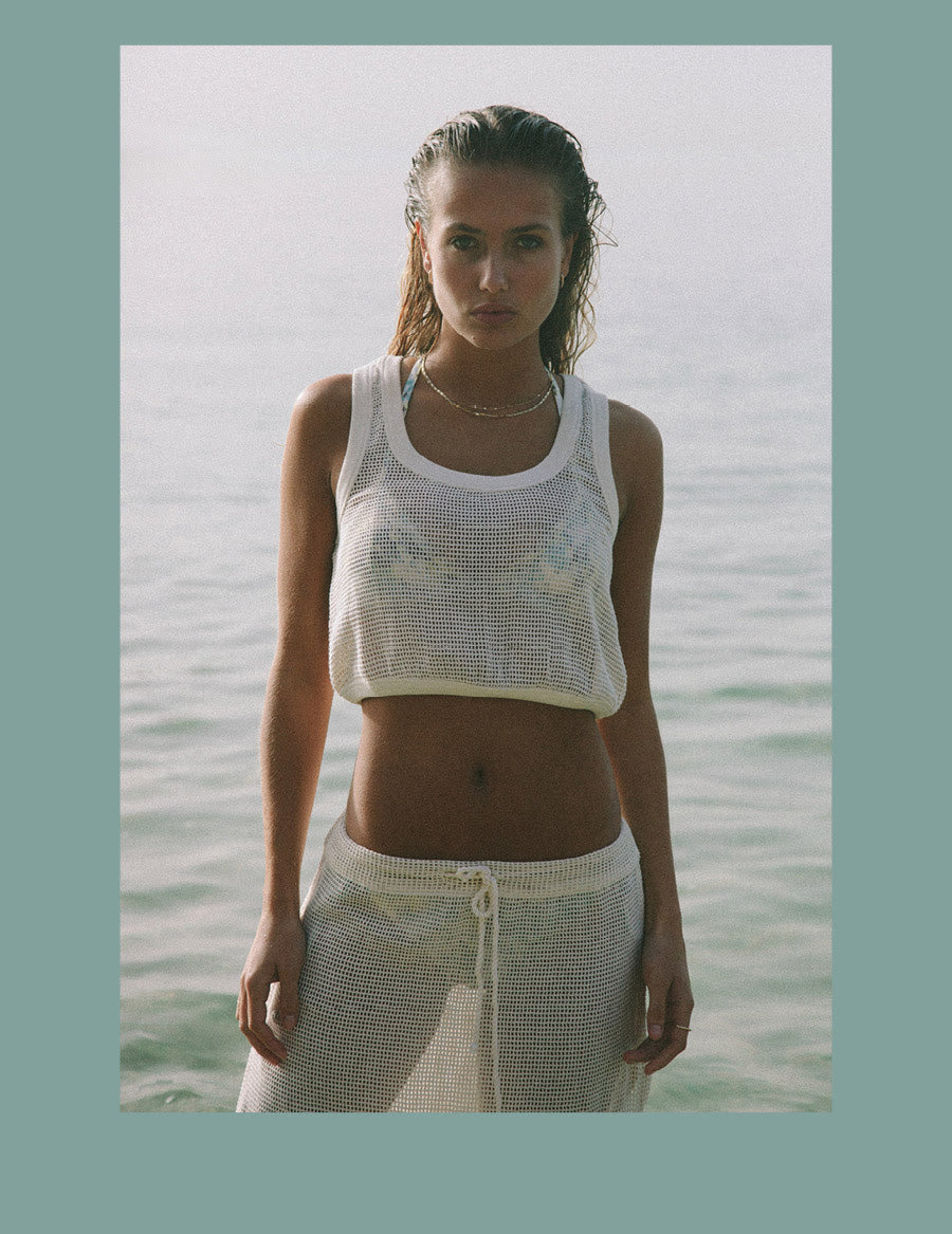 Model wears the Sweet Thing Knit with Gold Flower Skirt