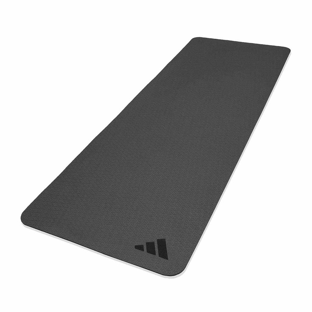 a black Adidas yoga mat