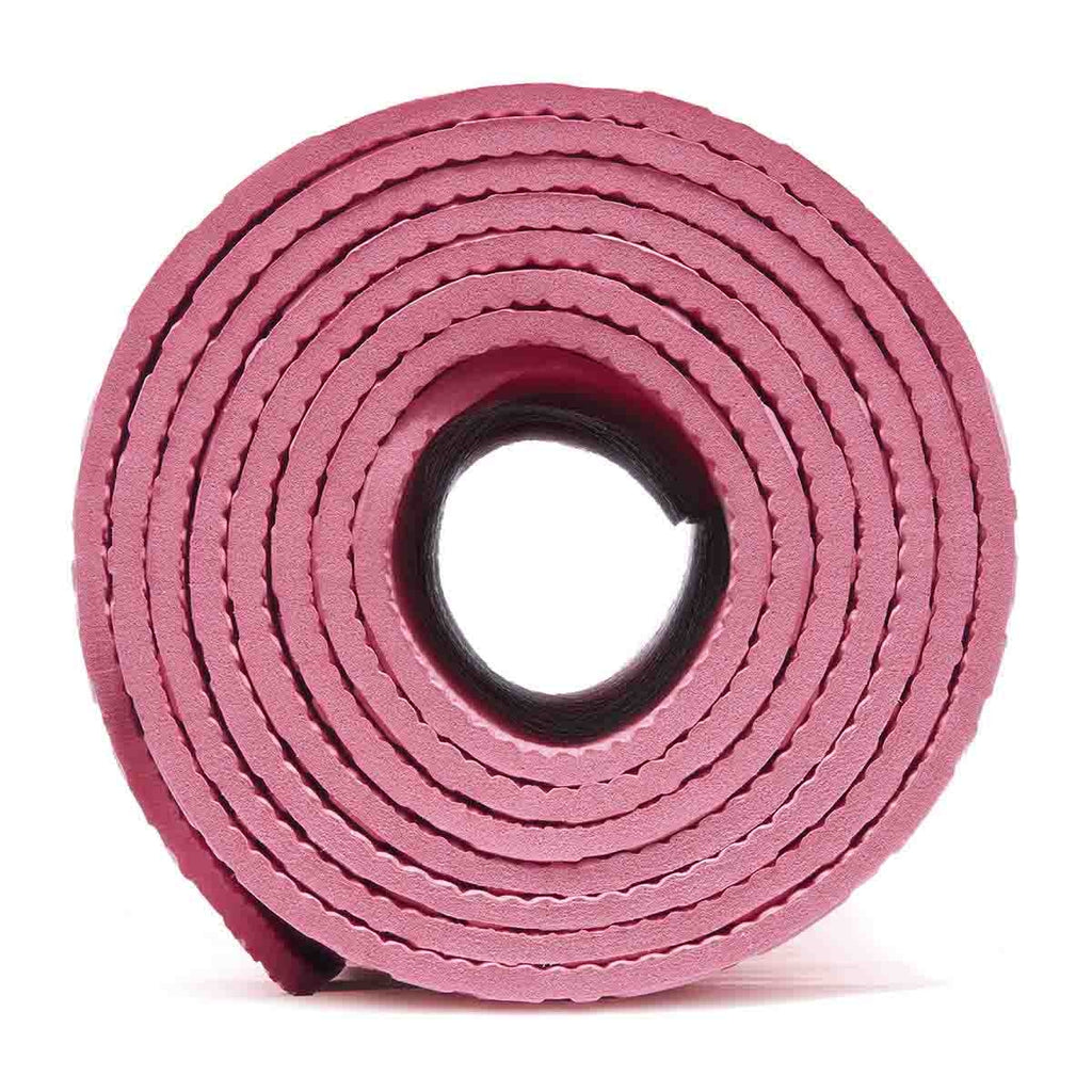 Pink yoga mat roll on a white background